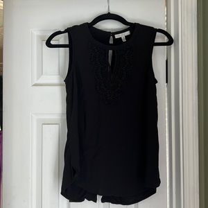 Black sleeveless top with lace detail